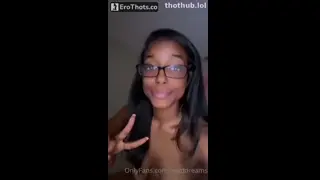 Lewddreams0 showing off glasses with right boob out teasing